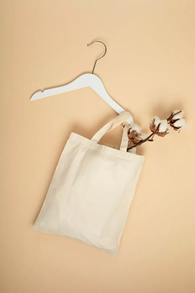 Mockup with organic cotton tote bag. Sustainable ethical consumption idea